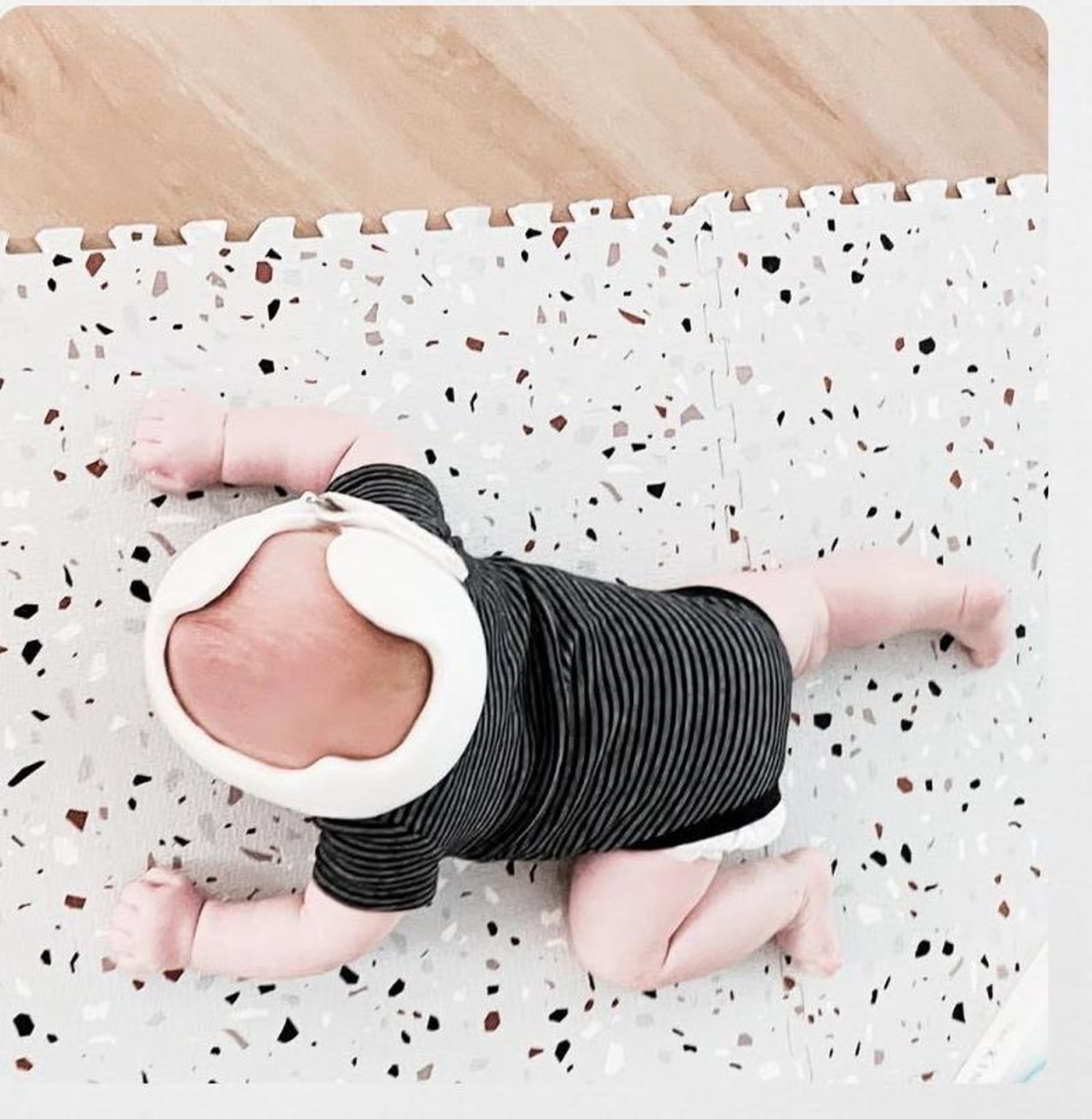 Baby wearing a cranial remolding helmet